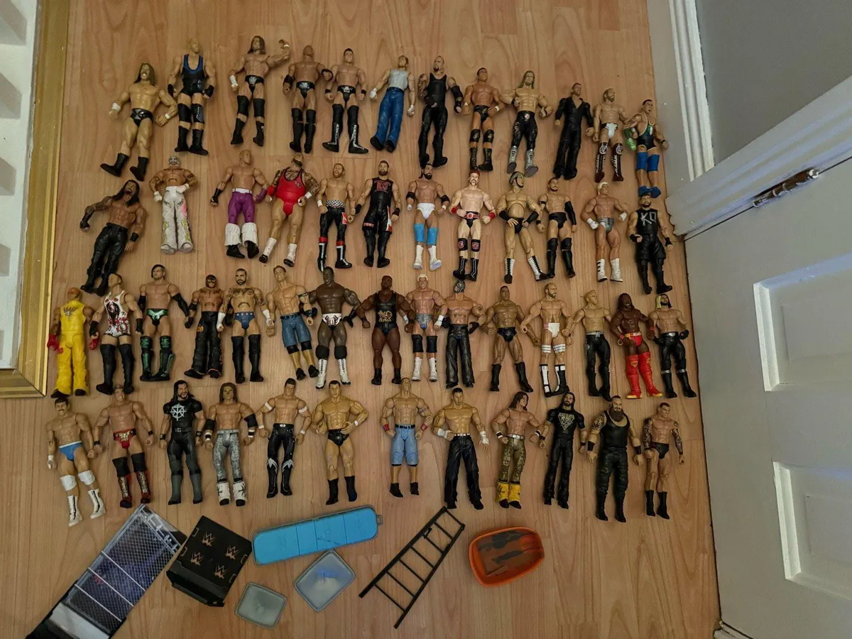Wwe 50 wrestling figures , accessories & T shirts - Image 1