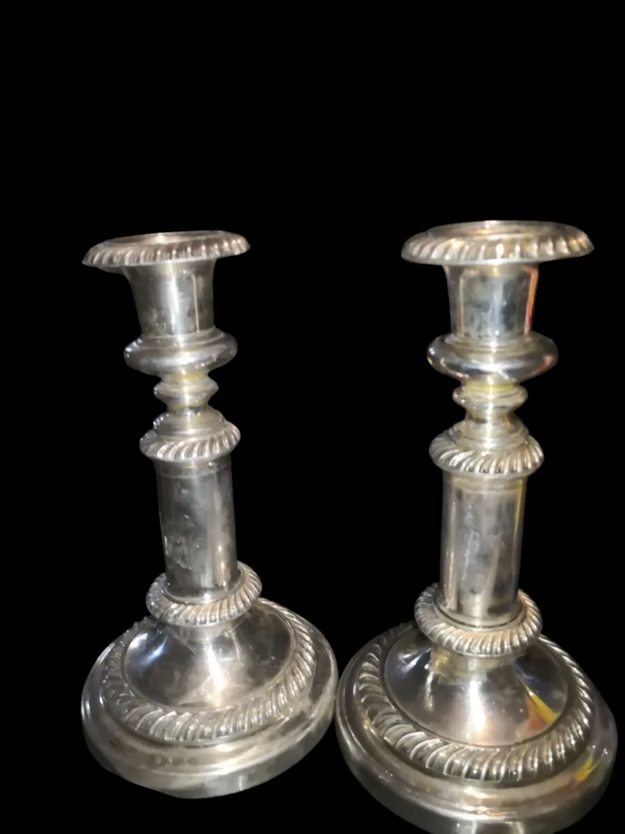 Pair of heavy antique candlestick