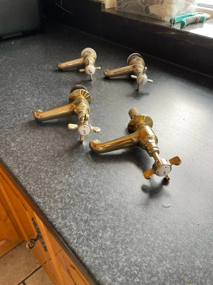 Hand basin taps