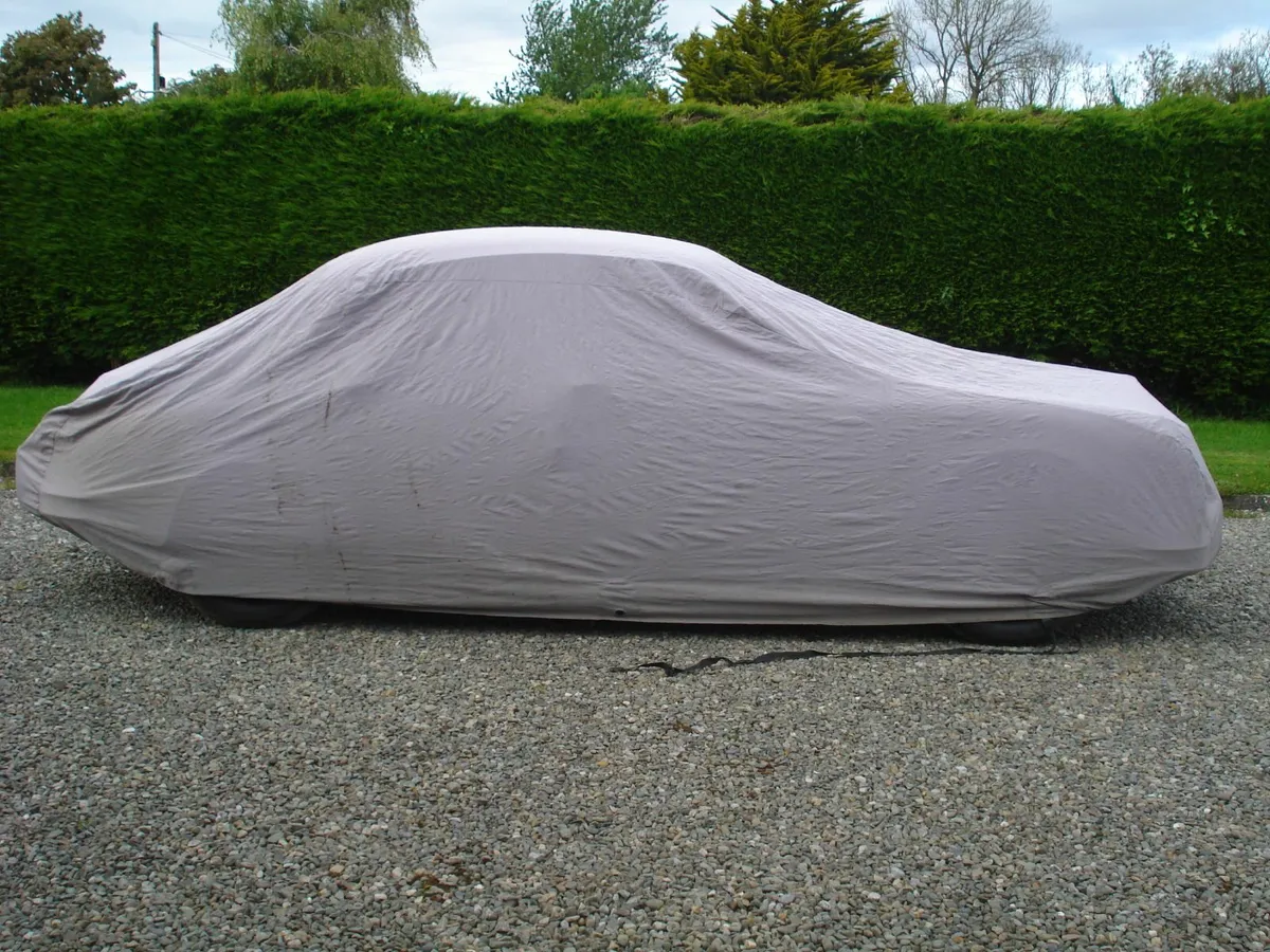 LARGE BREATHABLE WATERPROOF OUTDOOR CAR COVER. - Image 1