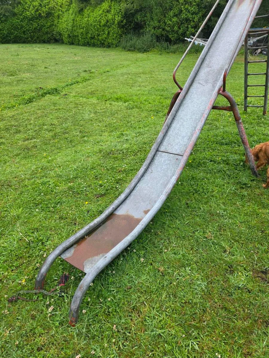 A slide and a trampoline - Image 1