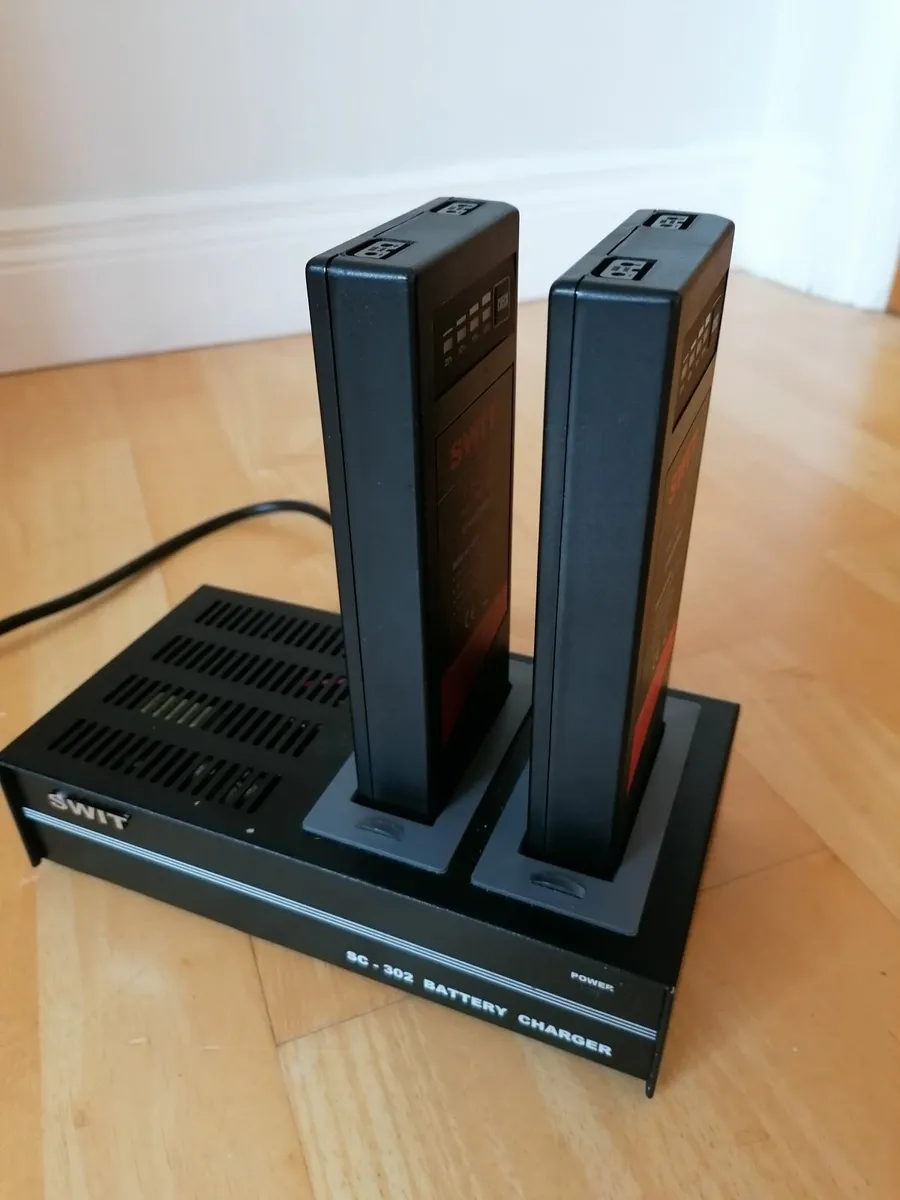Swit Batteries and Charger - Image 1