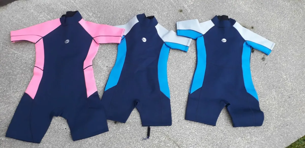 Selection of kids wetsuits - Image 1
