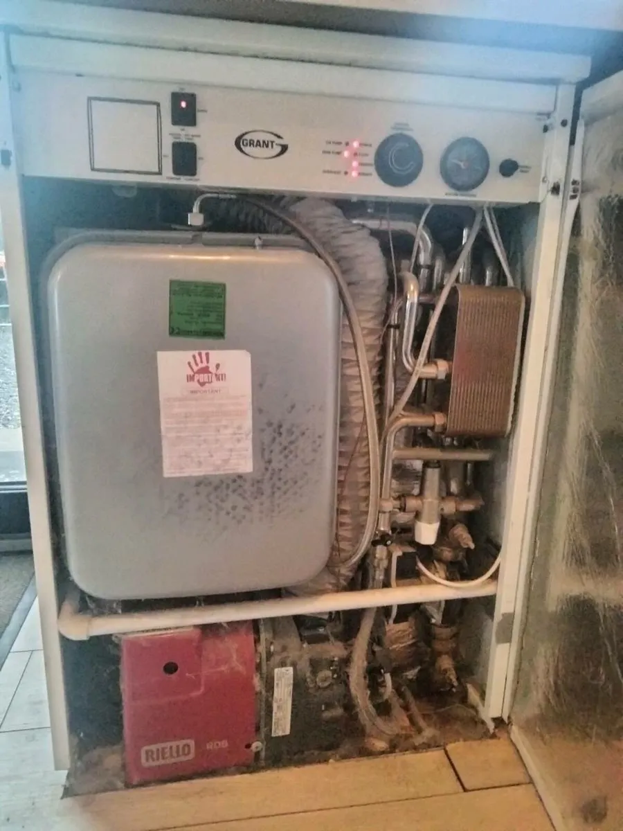 Grant Combi boiler 36 KW inside unit - Image 1