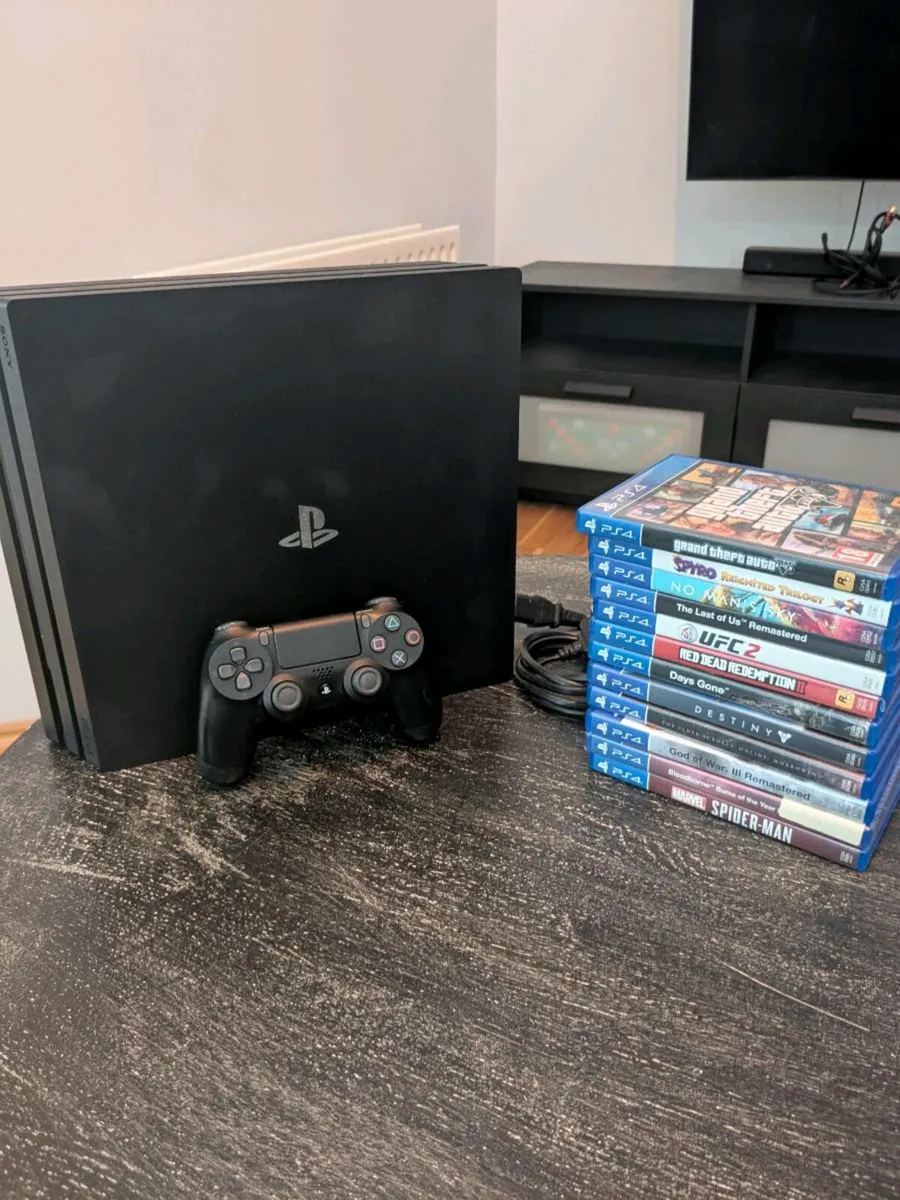 PS4 Pro + 12 Games - Image 1