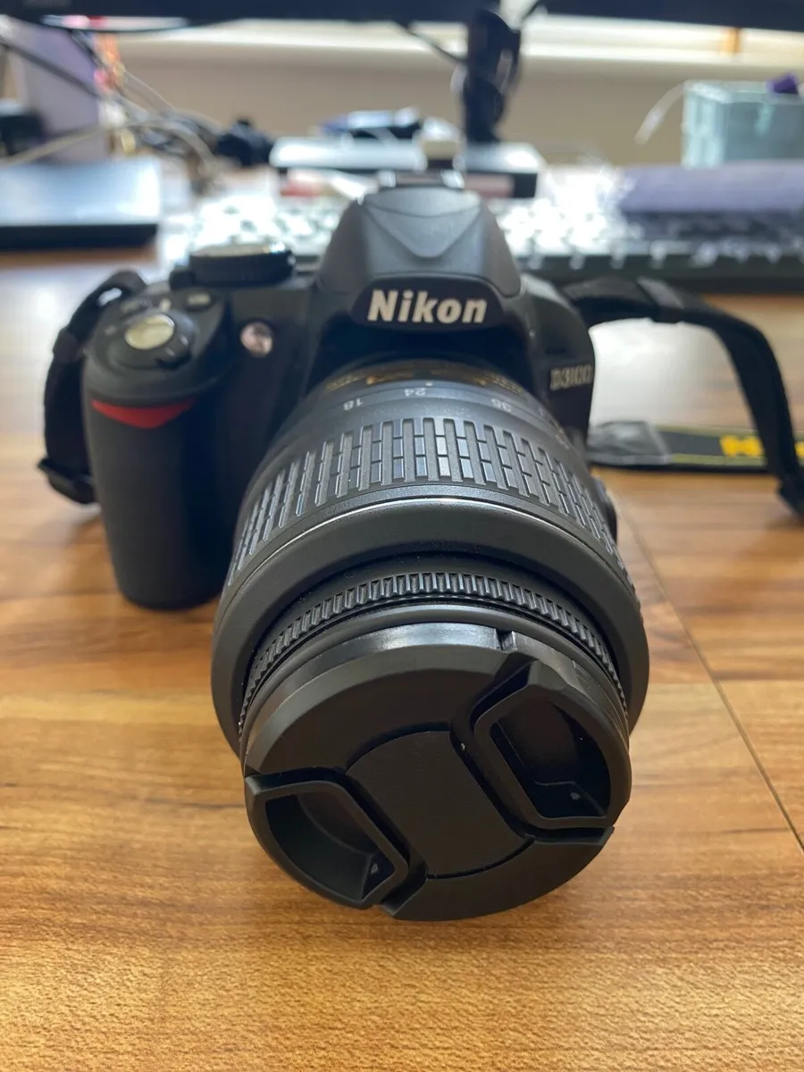 Nikon D3100 DSLR Camera + 18-55mm Zoom Lens - Image 1