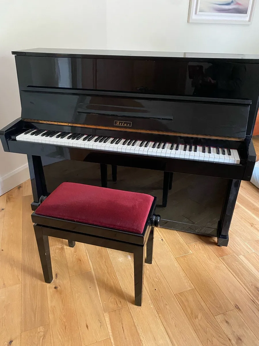 An Atlas Upright Piano and matching stool - Image 1