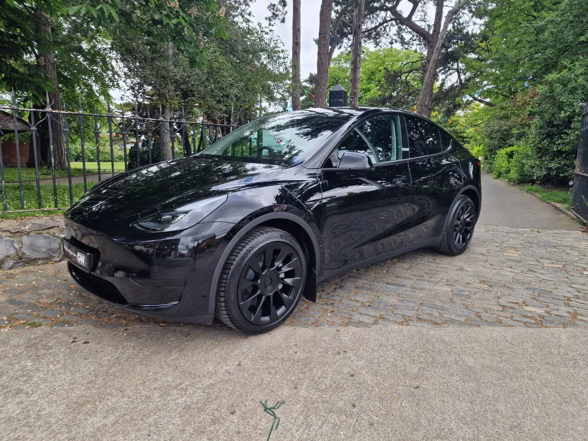 2023 (231) Tesla Model Y AWD Long Range - Image 1