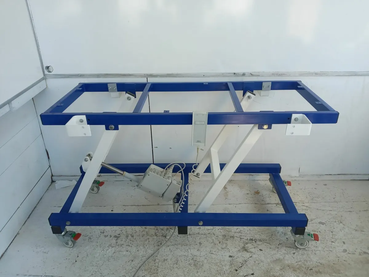 Delivery - Height Adjustable Work Bench Electric - Image 1