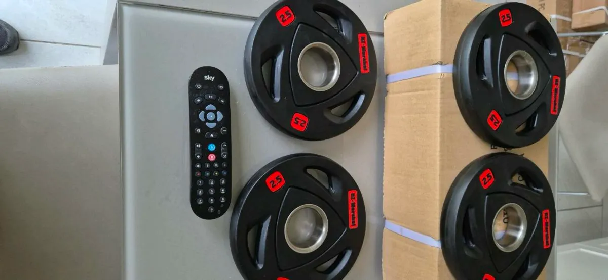 Brand new 4x2.5 kilo Olympic weight plates - Image 2