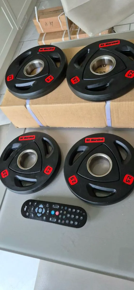 Brand new 4x2.5 kilo Olympic weight plates - Image 4
