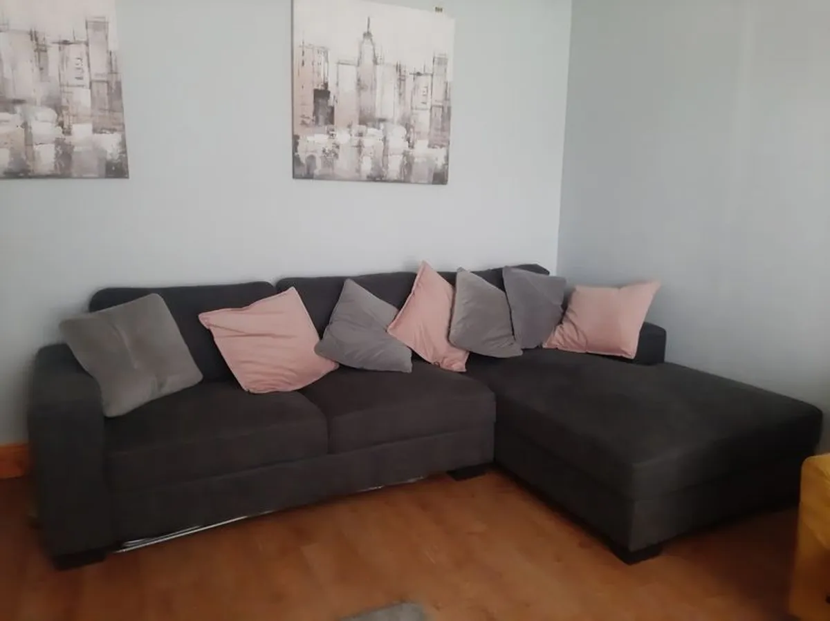 Corner L shaped grey sofa with foot stool with atorage and  mustard chair - Image 1