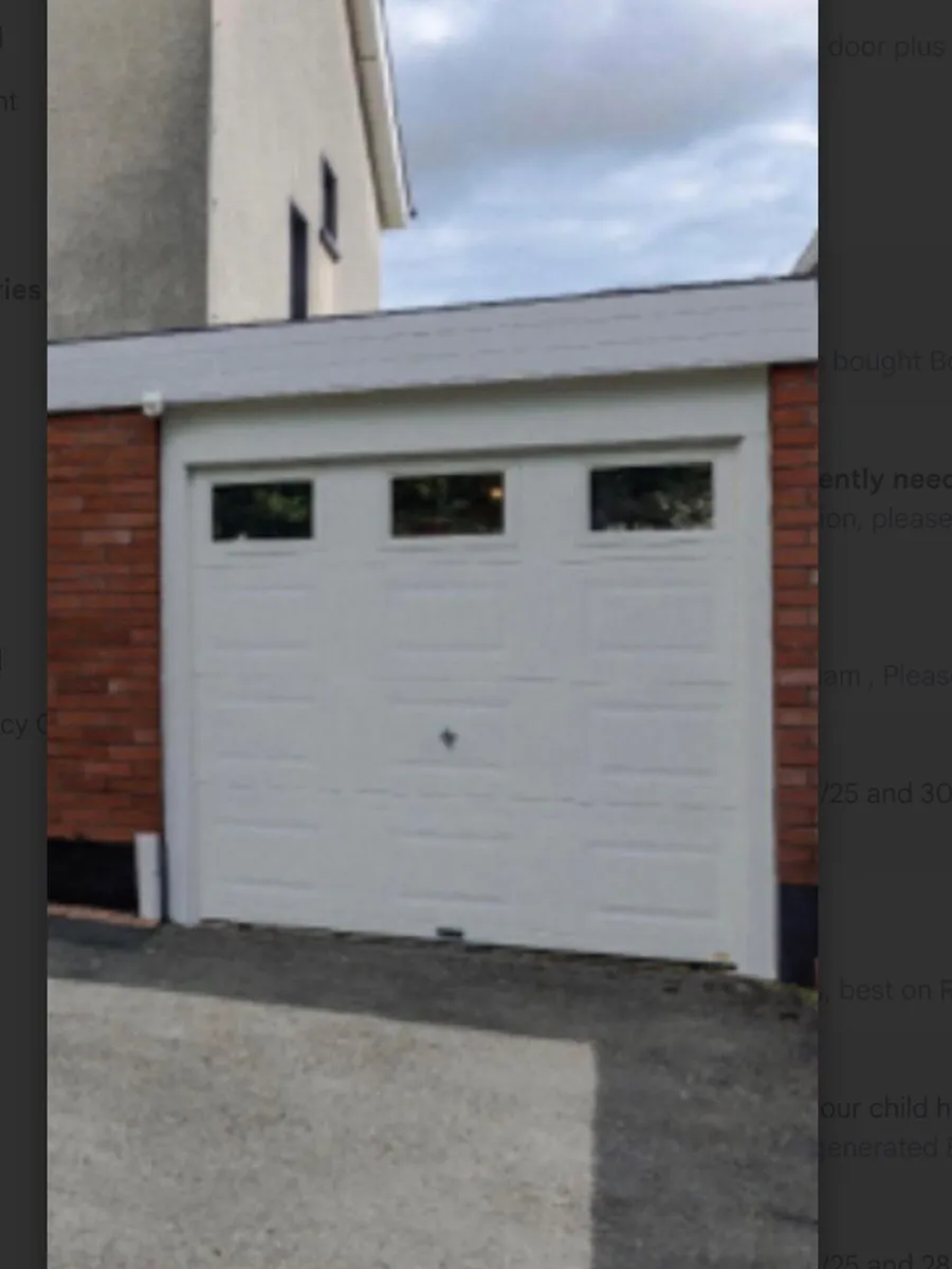 Garage door with frame mechanism - Image 1