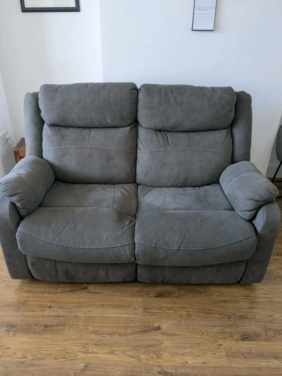 Two seater charcoal recliner sofa - Image 1