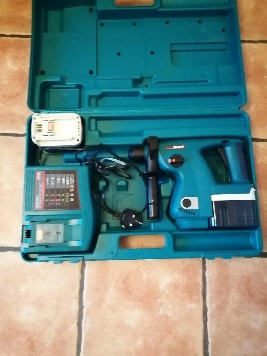 Makita 24v sds drill with 2 brand new batteries - Image 1