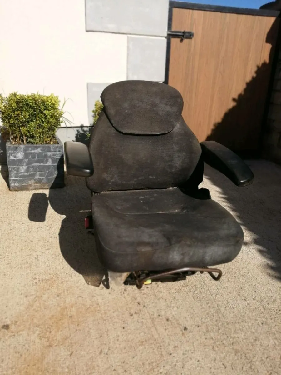 Tractor air seat and loader. - Image 2