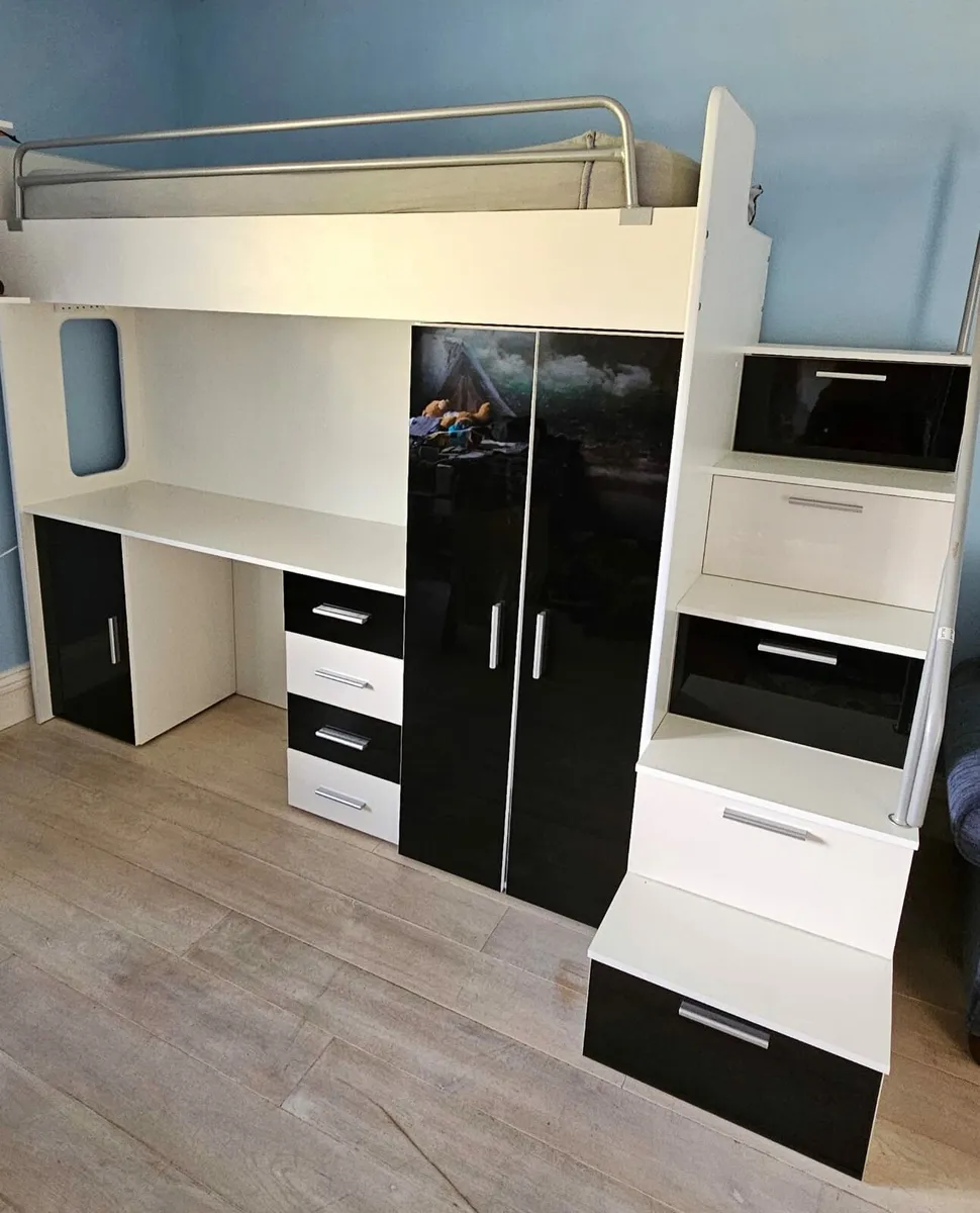 raised bed with desk, wardrobe and storage steps