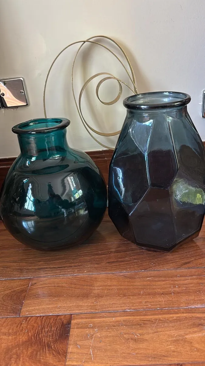 Decorative glass jars and metal artwork