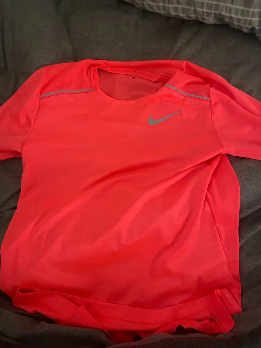 Pink Nike miller t shirt