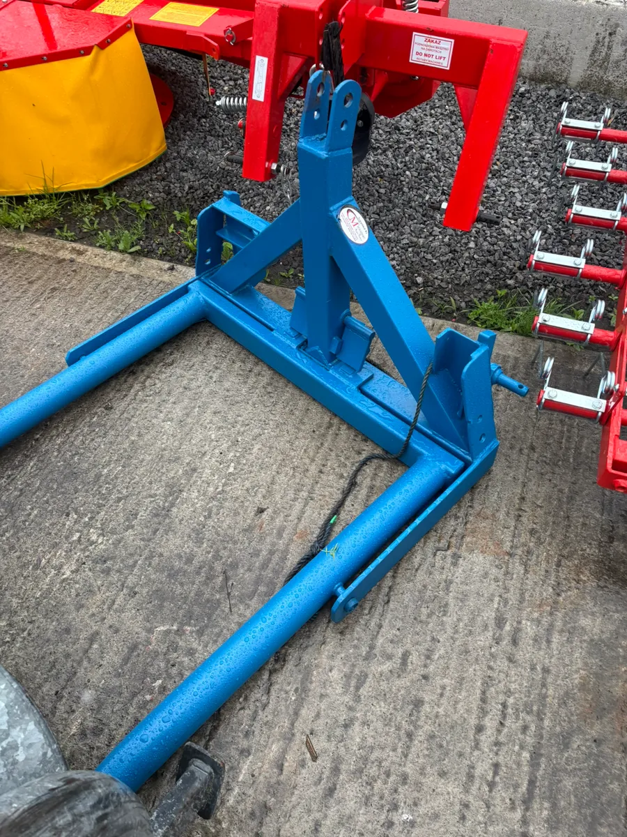 TRIP BALE HANDLER