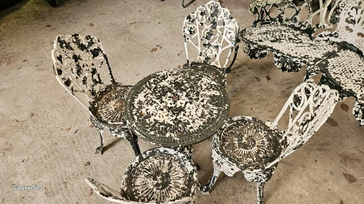 Cast iron table and four chairs - Image 2