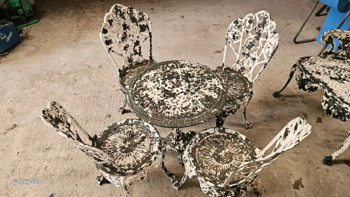 Cast iron table and four chairs - Image 3