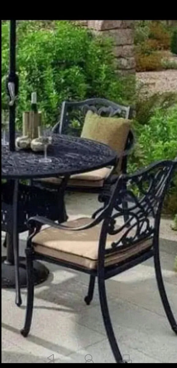 Brand New Bronze Stackable Cast Alum Chairs x 4 - Image 1