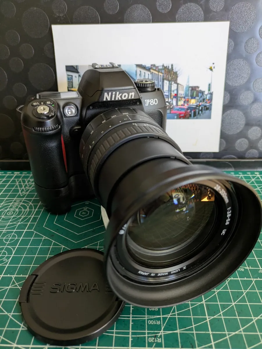 Nikon F80 + AA battery grip + Sigma 28-200/3.8-5.6 - Image 1