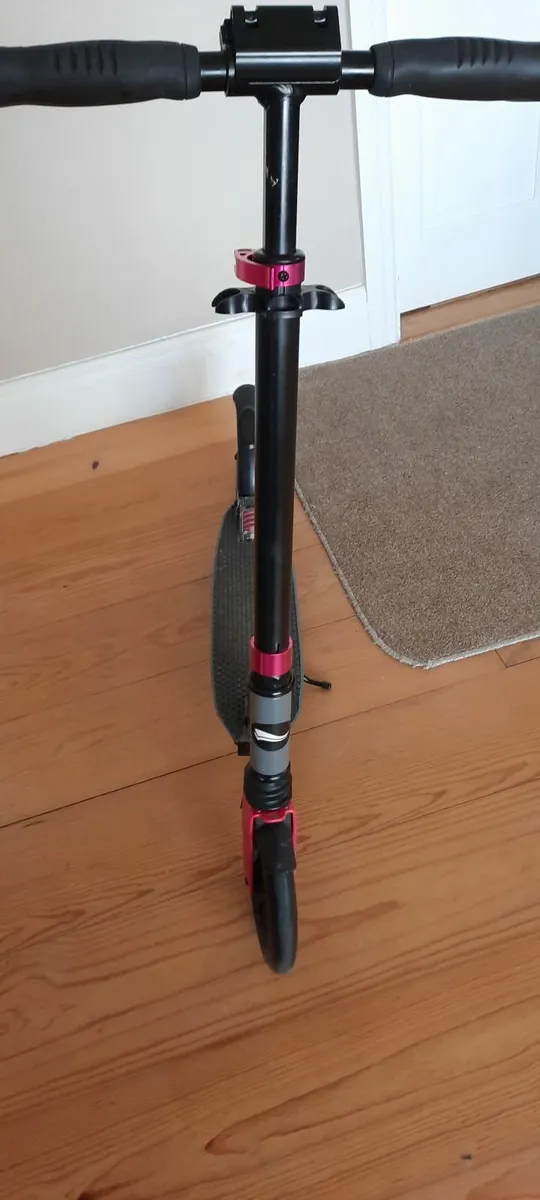 Black and pink scooter - Image 1