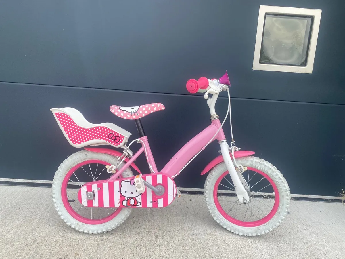 Girl’s bike with baby carrier - Image 1