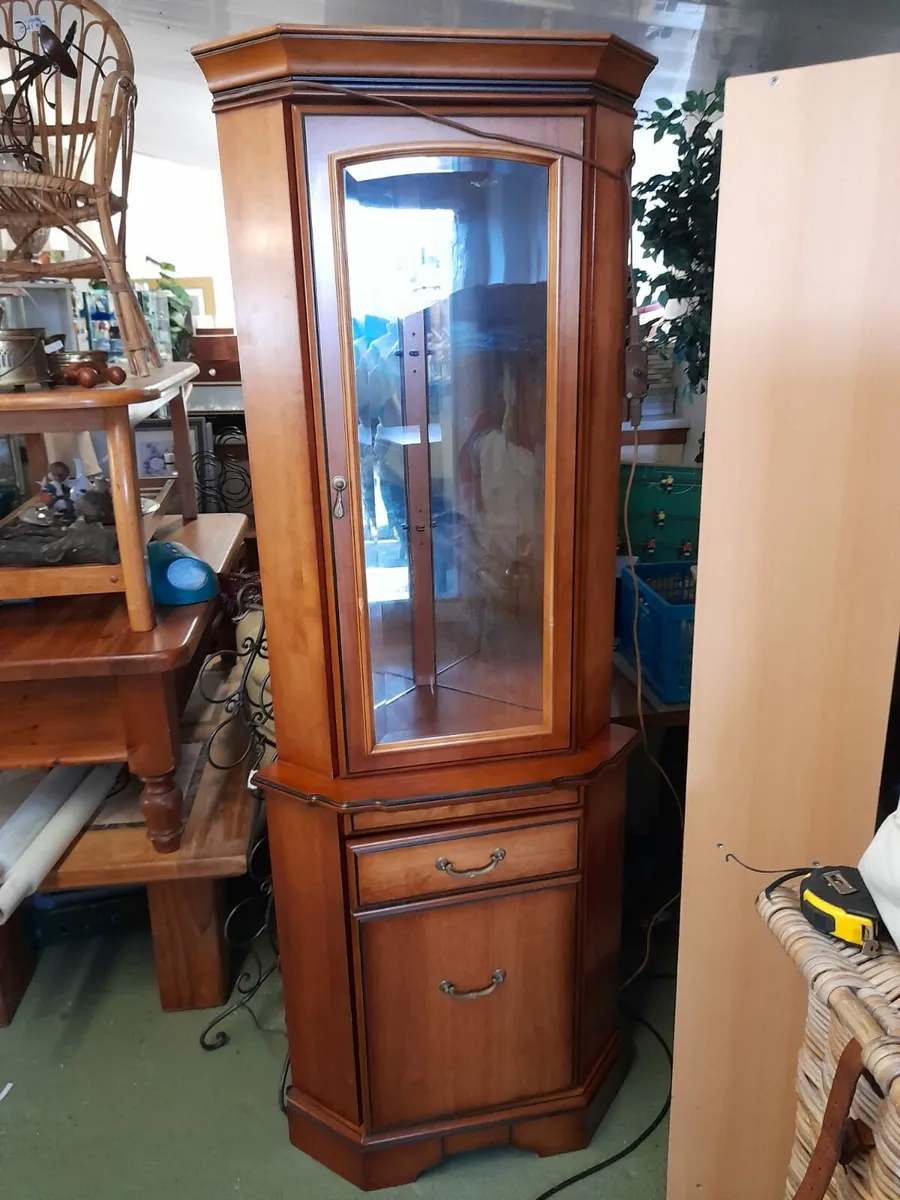 Yew light up corner cupboard