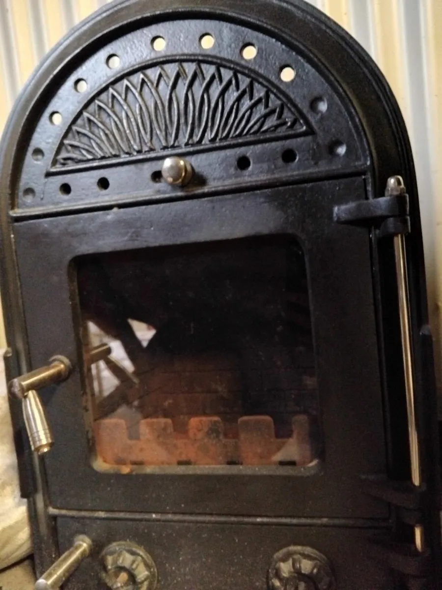 Inset wood stove