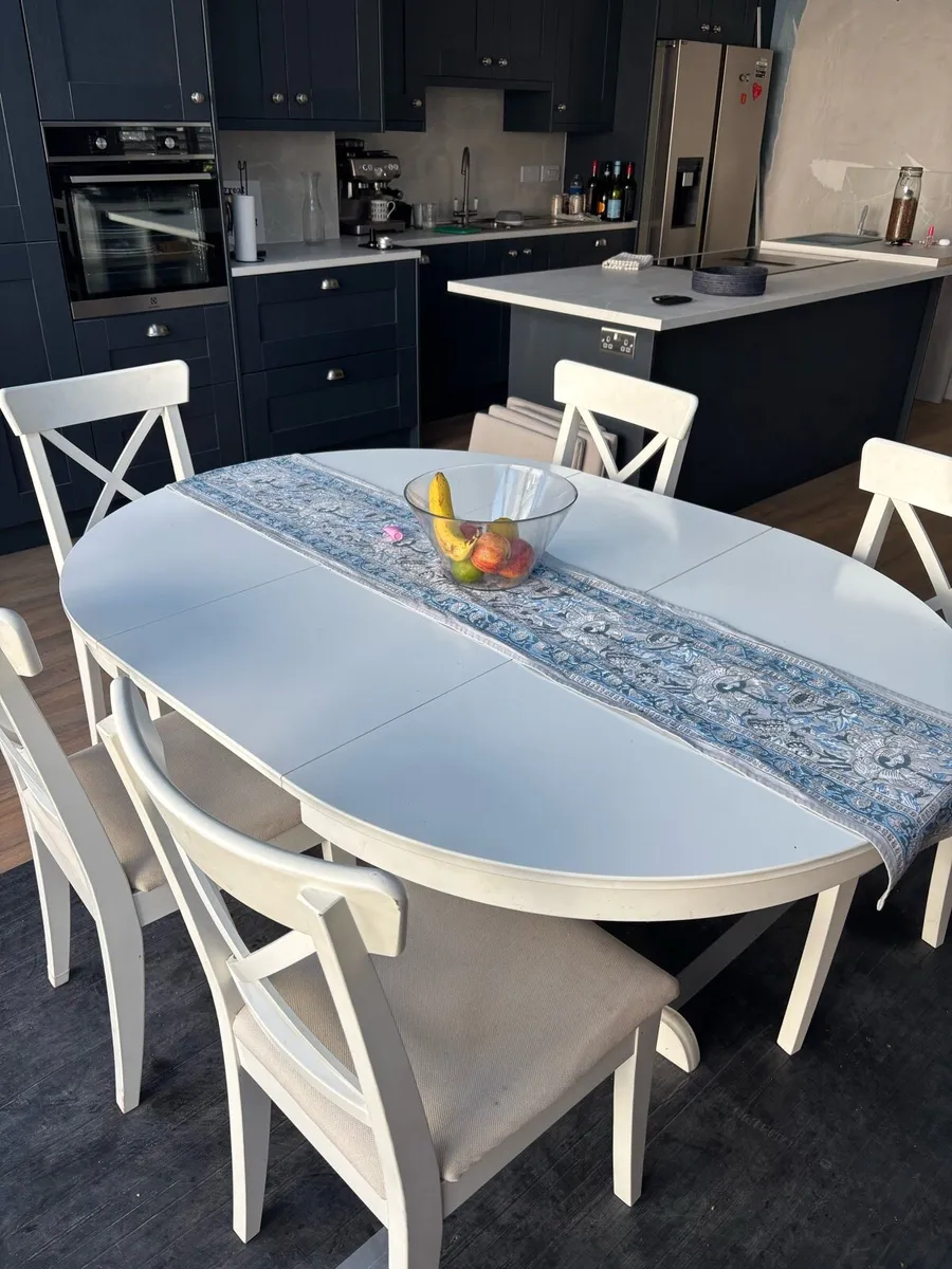 IKEA Extendable dining table and 6 chairs - Image 1