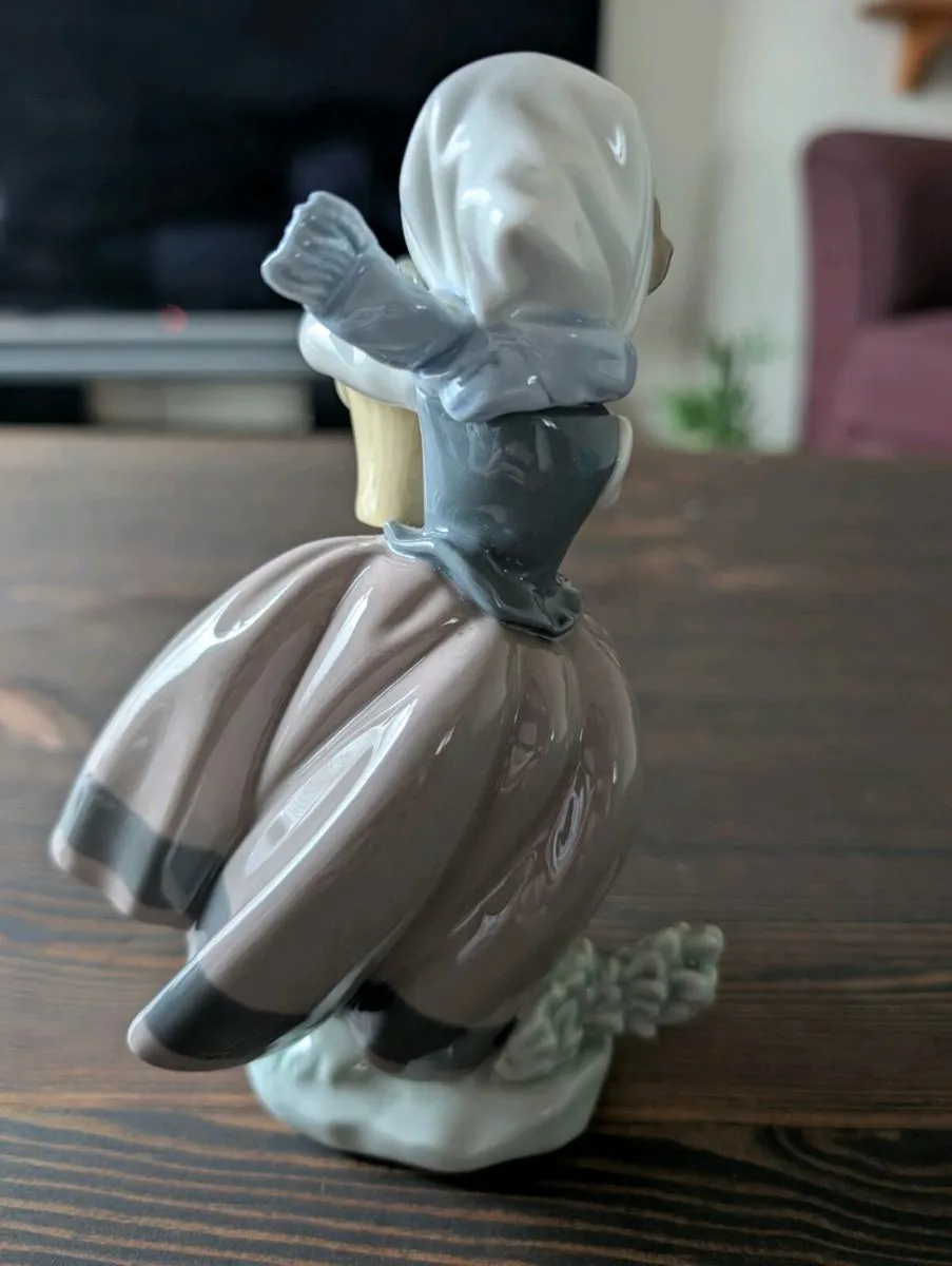Lladro "Spring is Here" Girl with flowers figurine - Image 3