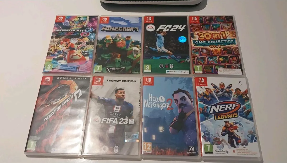 Nintendo Switch + 8 Games, Charger & Case - Image 2