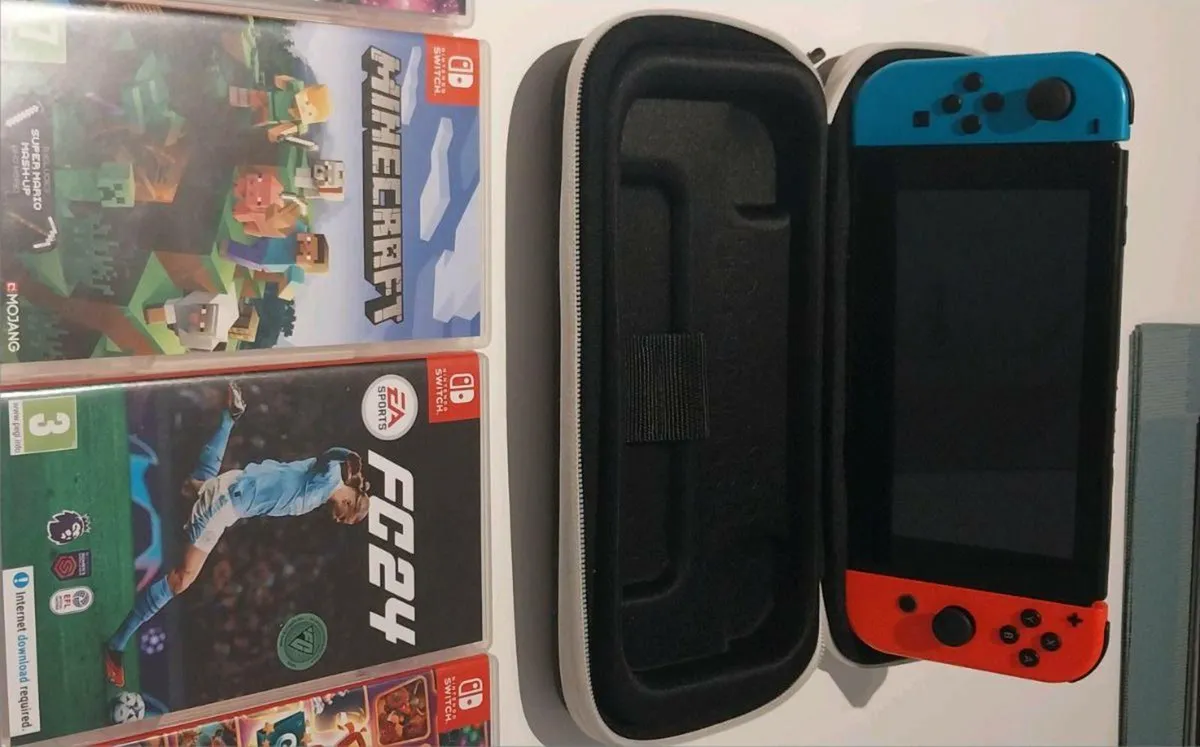 Nintendo Switch + 8 Games, Charger & Case - Image 3