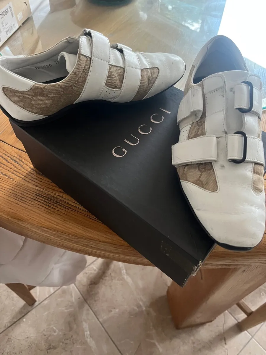 Gucci women’s white Leather monogram sneakers - Image 1