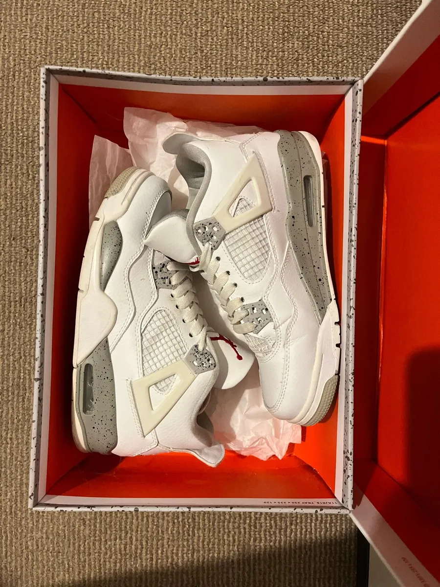 Air Jordan 4 Retro “White Oreo” Sneakers - Image 1