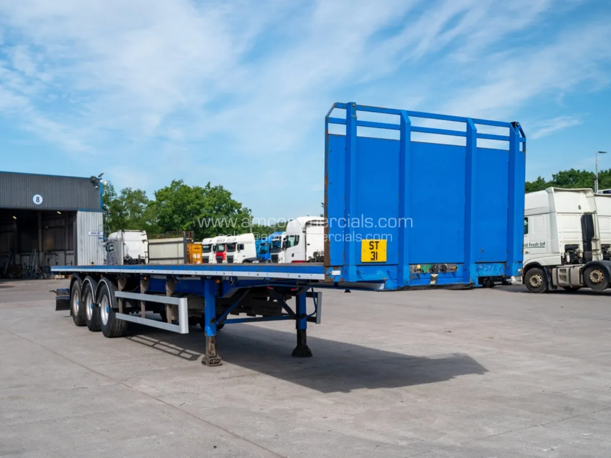 2015 SDC 3-AXLE FLATBED TRAILER - Image 1