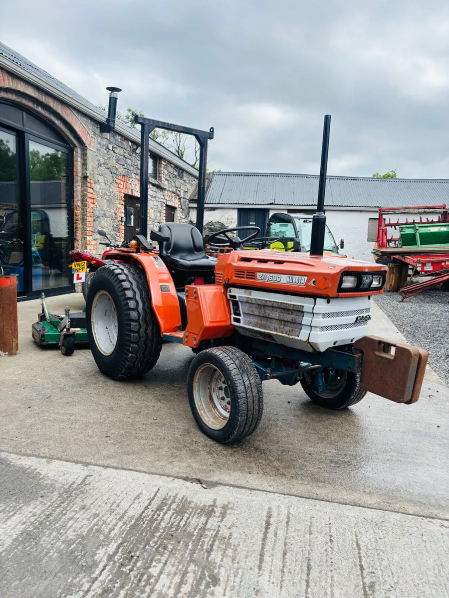 Kubota compact tractor and finishing mower - Image 1