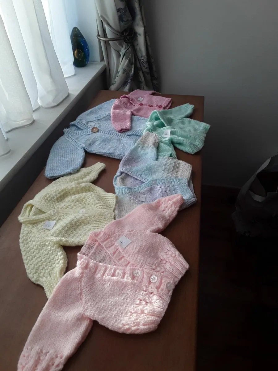 Selection of hand knitted brand new baby cardigans - Image 1