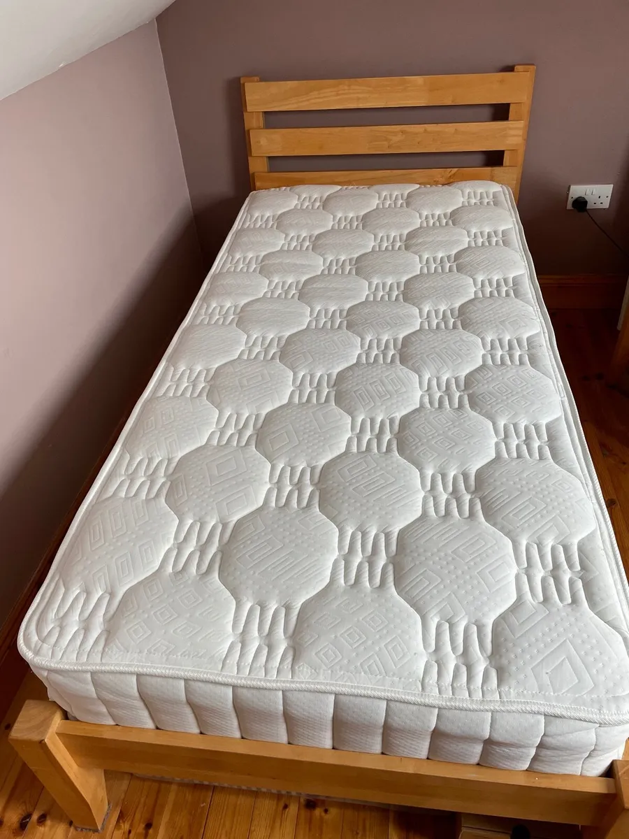 2 pine single beds and mattresses - Image 1