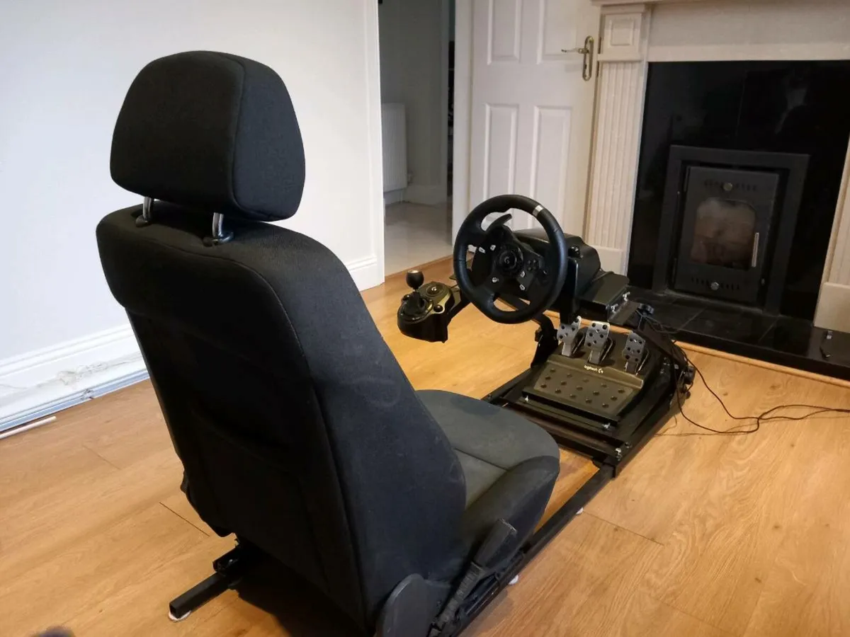 Logitech steering wheel, peddles and real car seat - Image 1