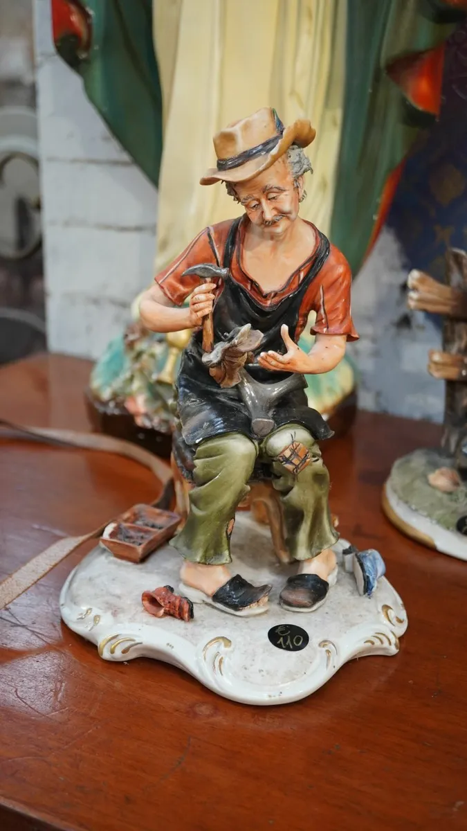 🧑‍🎨 Porcelain Figurine – Shoemaker at Work - Image 1
