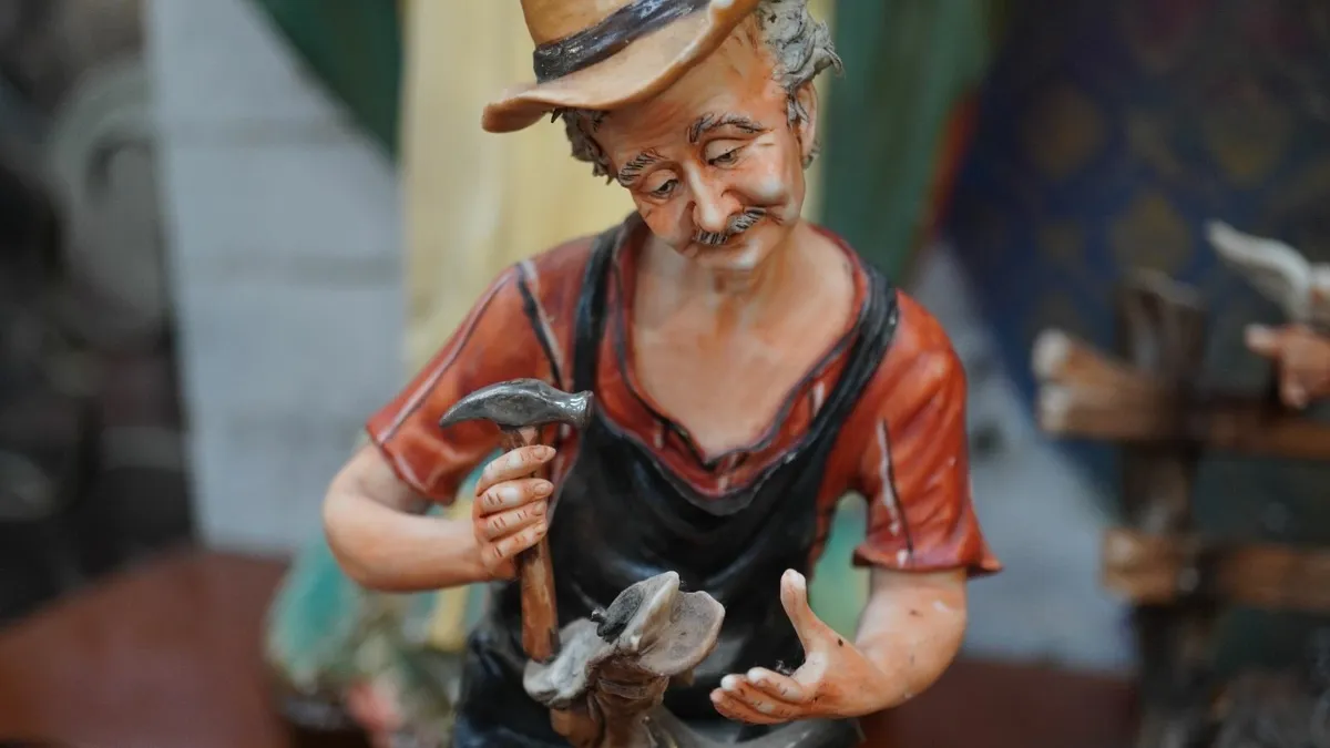 🧑‍🎨 Porcelain Figurine – Shoemaker at Work - Image 2