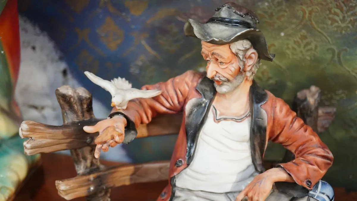 🧓 Porcelain Figurine of Seated Elderly Man with B - Image 2