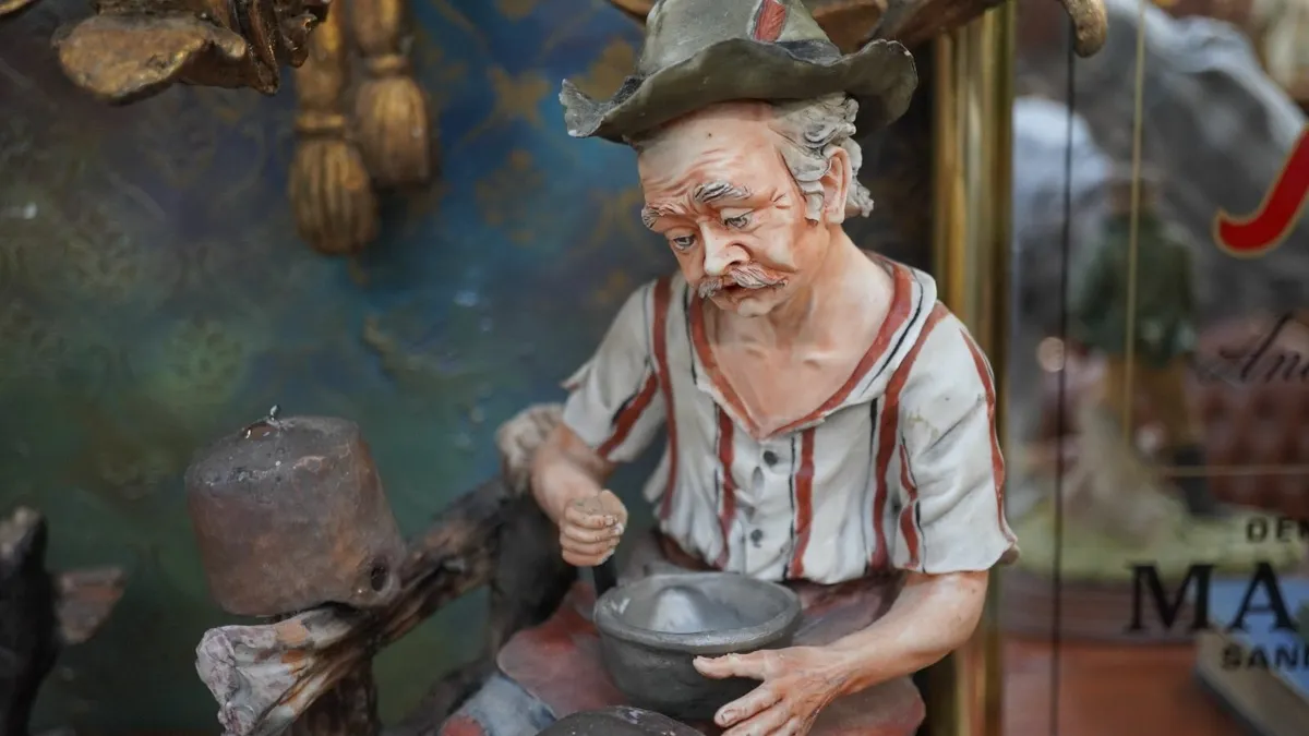 Porcelain Figurine – “Helmet Maker” by Marini - Image 2