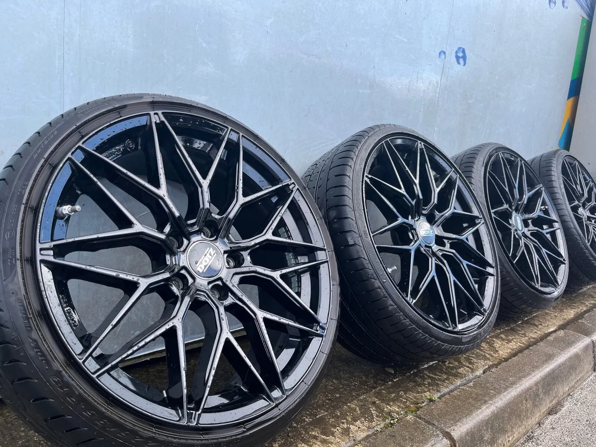 Suzuka Black Dotz Alloys 19” With Pirelli Tires - Image 1