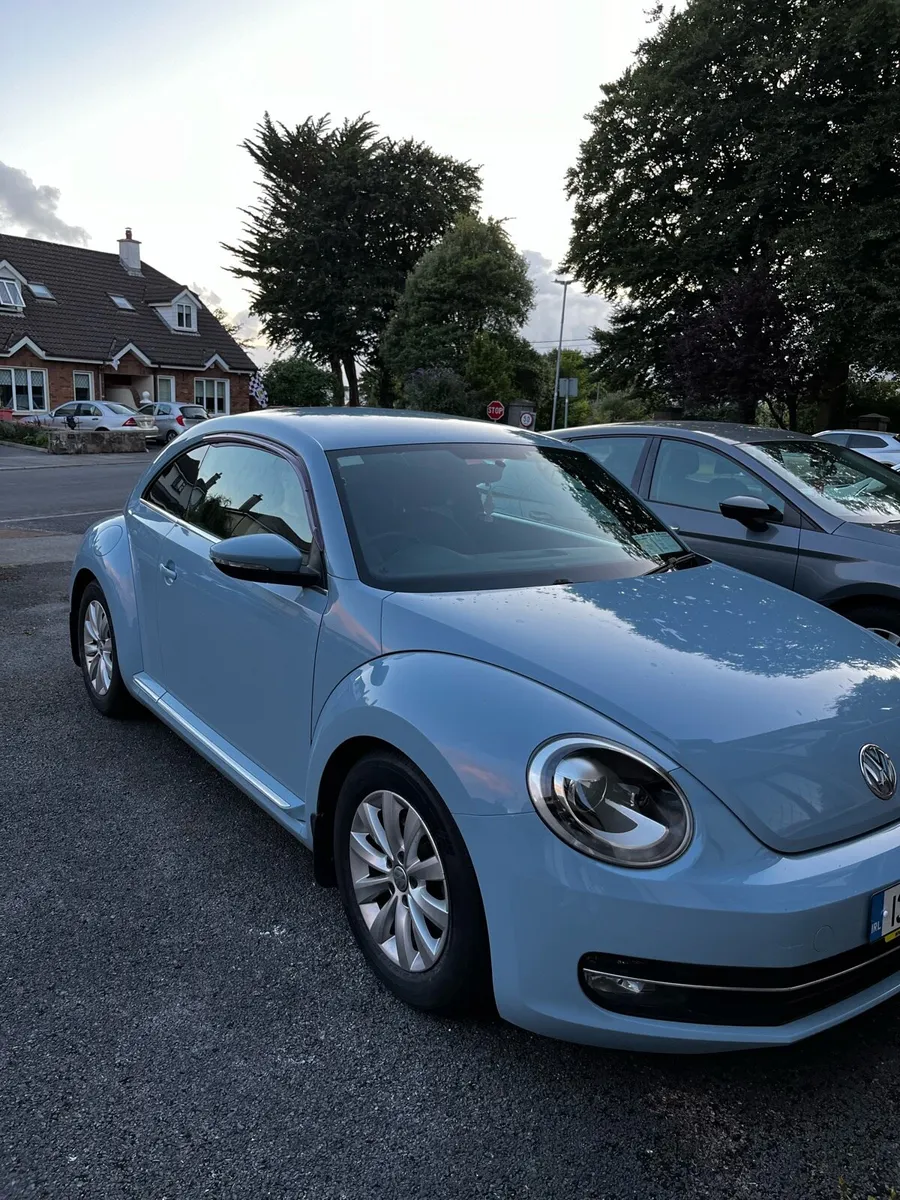 Baby blue Volkswagen Beetle - Image 1