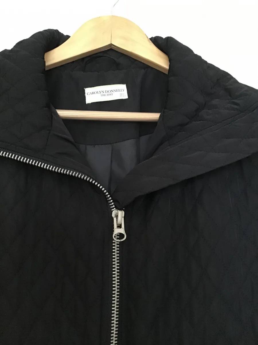 A black Carolyn Donnelly coat - Image 1
